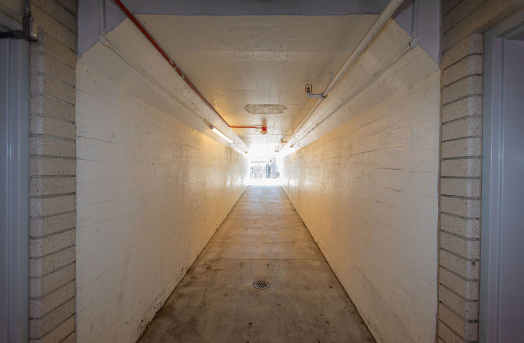 sun shining through tunnel