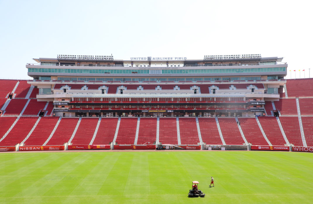 field with bleachers