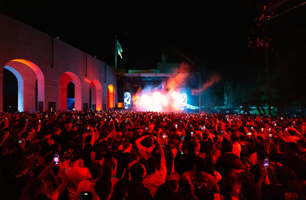 crowd under red light